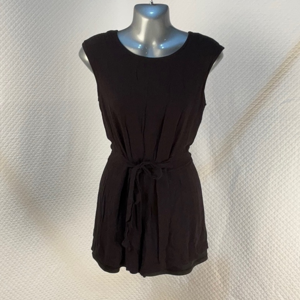 Caramella black short romper that ties in front, open back Medium